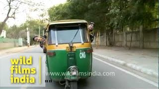 A tuk-tuk or auto rickshaw on the streets of Delhi, India
