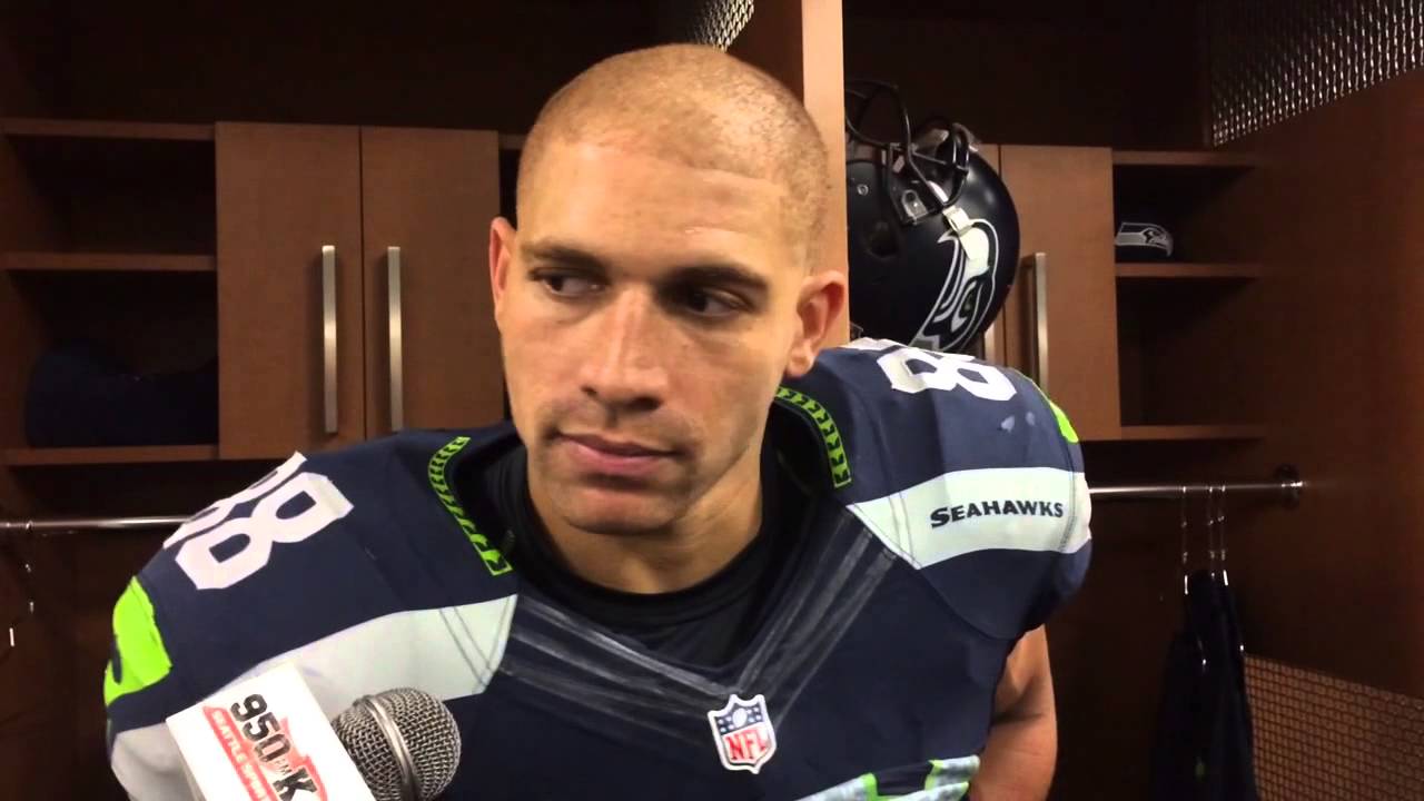 Jimmy Graham  - 2024 Regular brown hair & alternative hair style.
