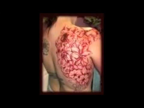 scarification tattoo. BODY SCARIFICATION TATTOOS