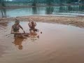 Kayla and Brady taking a mud bath!