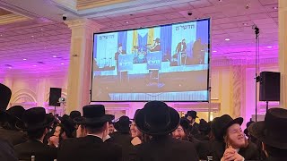 Velvl Schmeltzer & Yitzchok Shlomo Drezner On The RCCS Organization Diner Stage