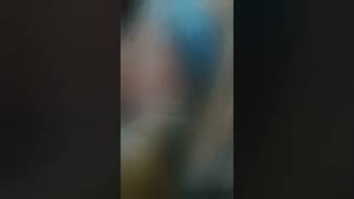 İnci Küpeli Kadın.. Kedisiyle