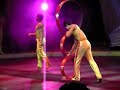 peking acrobats jumping through hoops