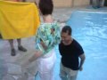 Mom getting tossed in the pool!!!