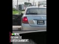Guyanese man beating his girlfriend in his  car.