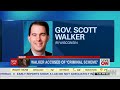 Walker accused of 'criminal scheme'