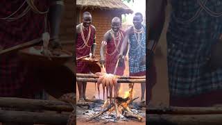 African Village Feast Giant Octopus Roasted Over Fire. -Ai