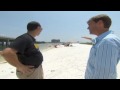Florida tourist and tar ball don't mix