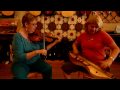 Julie Ann Johnson on fiddle and hog fiddle (dulcimer)