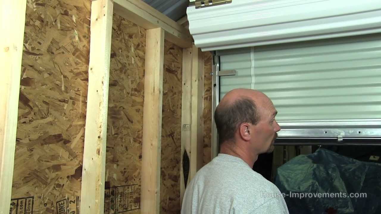How To Build A Shed - Part 5 Installing A Metal Roll-Up Door - YouTube