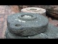 Ancient Hand operated millstone or Rock Flour Mill.wmv