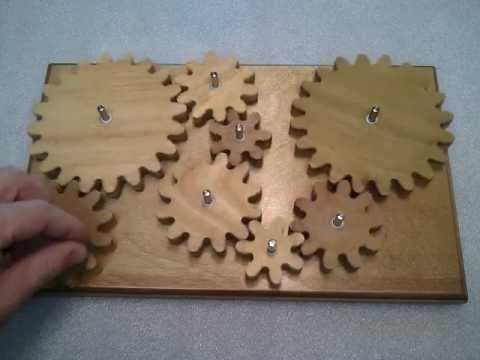 Wooden gear system (puzzle/toy) - YouTube