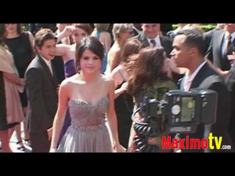 WHO WORE IT BEST? Selena Gomez vs Ashley Tisdale at 2009 Emmy WHO WORE IT BEST? Selena Gomez vs Ashley Tisdale at 2009 Emmy