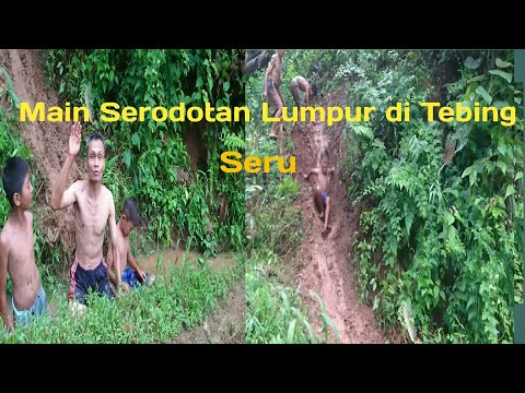 Main Perosotan Tanah Merah di Tebing