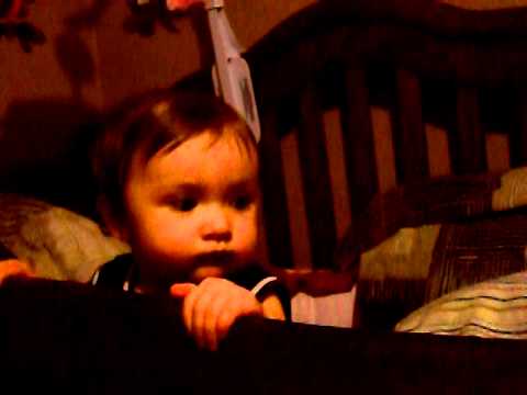 teething baby eating her bed