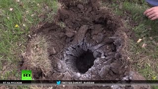 Неразорвавшиеся снаряды и воронки от фосфорных бомб: перемирие на востоке Украины