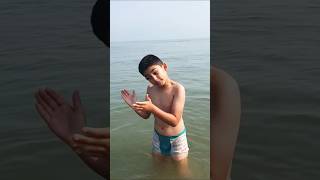 Boys Swimming At The Beach