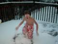 boy+makes+snowangel+in+swimsuit