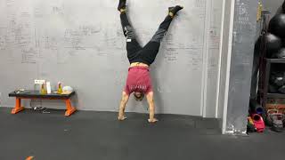 Hand Stand Shoulder Tap