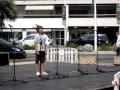 Young boy with fantastic voice singing near Palais des Festivals in Cannes, France