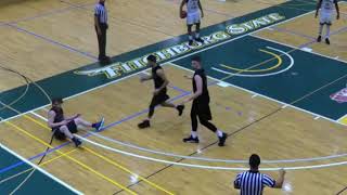 College basketball player knocks out opponent with elbow