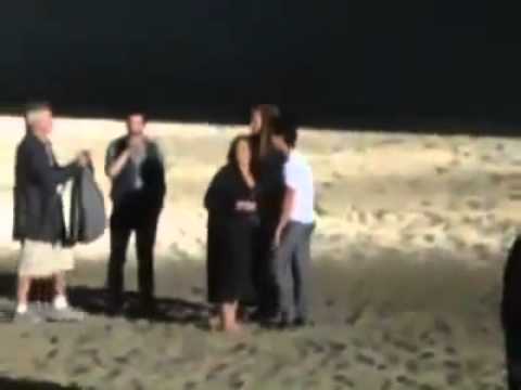 Demi Lovato and Joe Jonas kissing on the beach