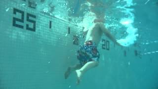 William Retrieving His Dive Sticks From The Bottom Of The Pool