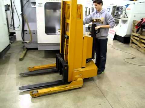 Rol-Lift Electric Pallet Stacker Lift Truck - YouTube