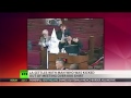 Man wears KKK hood to public meeting, gets $215,000
