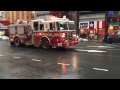 FDNY ENGINE 54 RETURNING TO QUARTERS AFTER EMS RUN ON W. 48TH ST. IN MIDTOWN, MANHATTAN, NEW YORK.