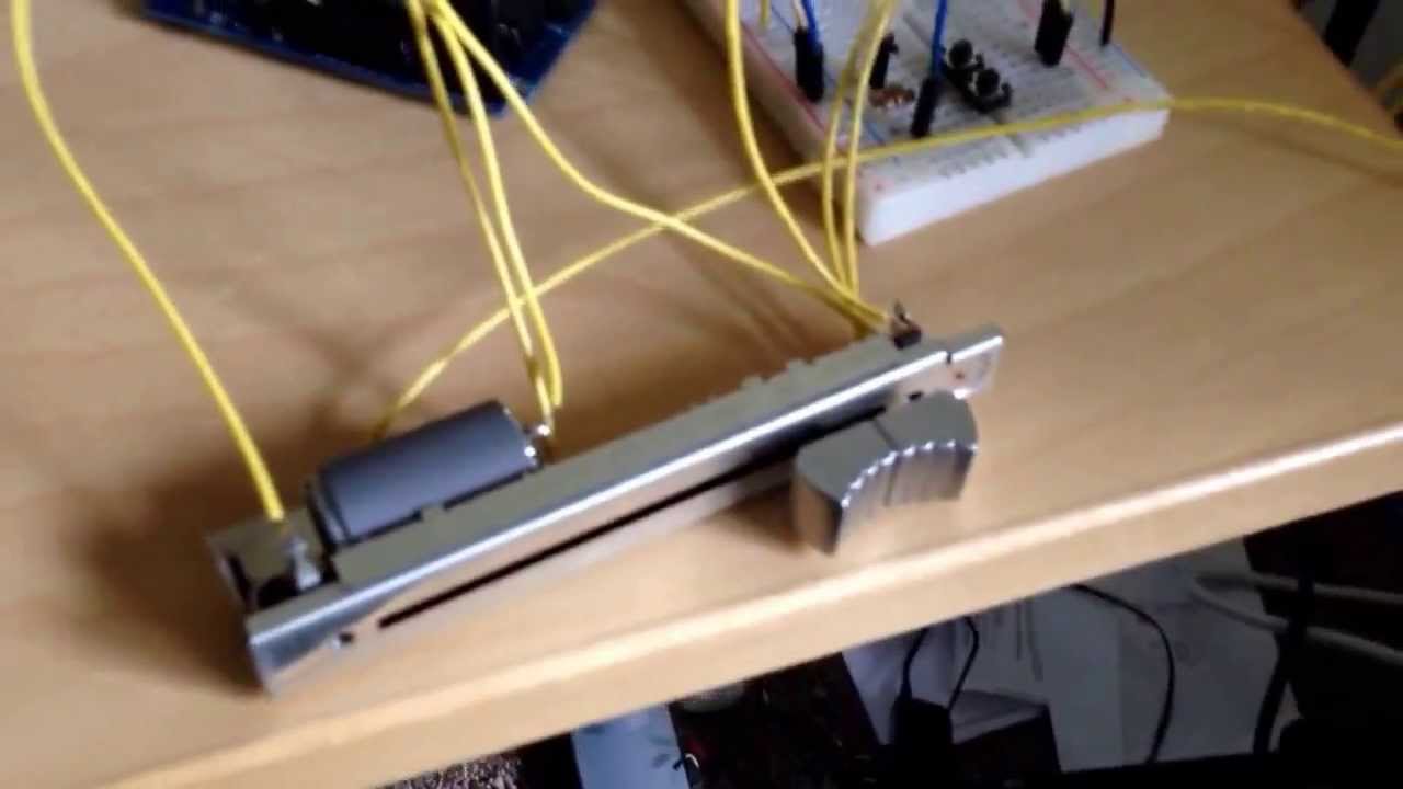Arduino control of linear slide potentiometer (flying fader). - YouTube