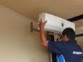 Installing AC units in a shipping container home in Costa Rica