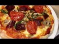 salami, green papper, tomato and mushroom pizza