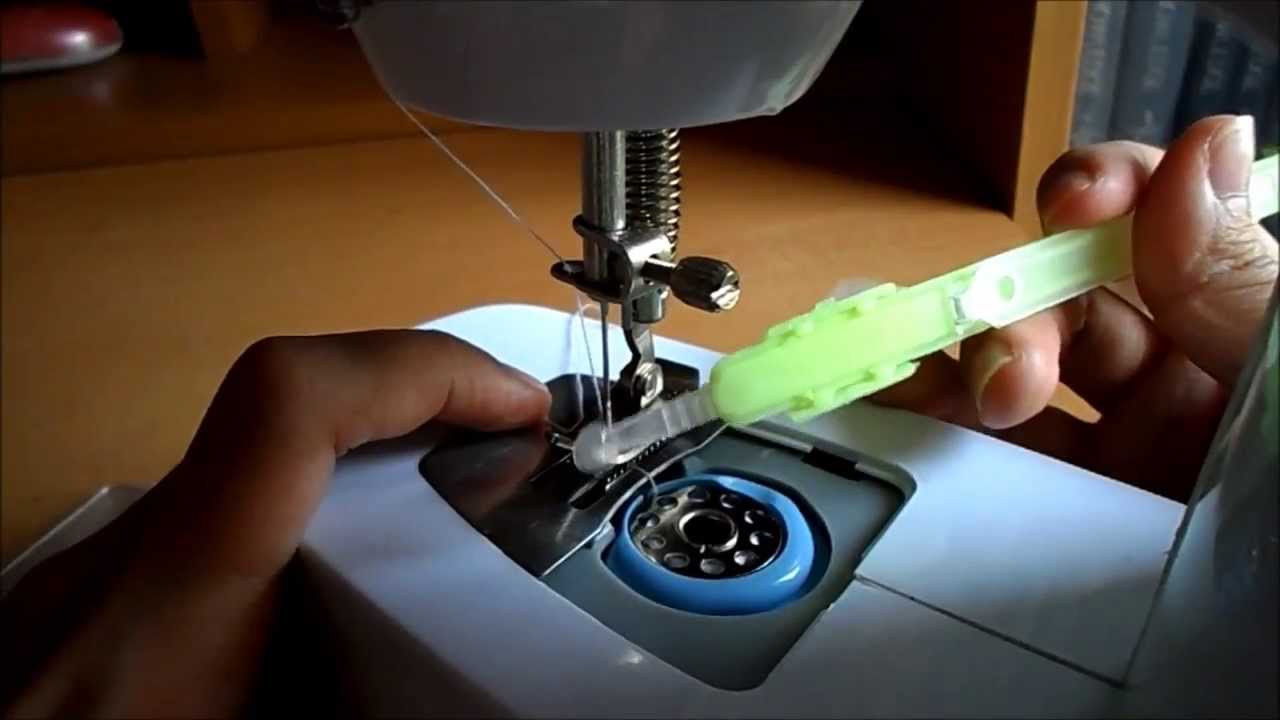 How to get the Thread from the Bobbin Case | Portable Sewing Machine