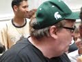 Sicko – Moore in front of New York Stock Exchange