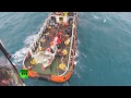 RAW: Russian rescuers help recover Air Asia tail