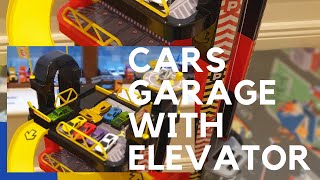 Busy Kid At The Cars Garage With Elevator