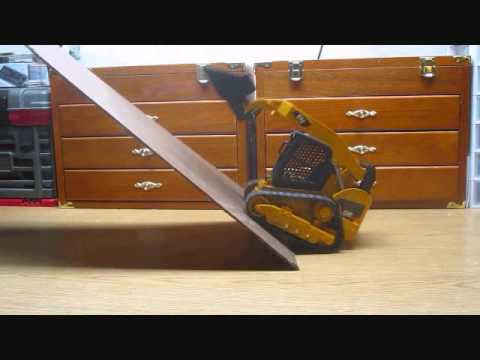 RC Cat Rubber Tracked Loader Steep Climb.wmv