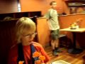 Scotish Scout puts Texas Pete on Cheese Cake in a Naval Base