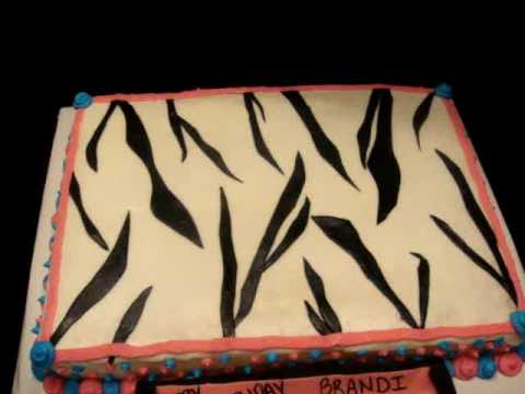 Zebra print cake with royal icing accents