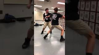 Two Big Boys Fighting In The Locker Room