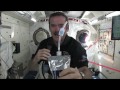 Chris Hadfield demonstrates how astronauts wash their hands in zero-g