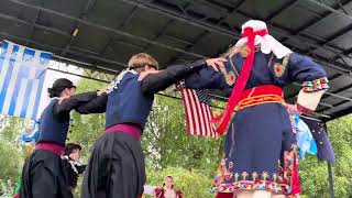 Greek Dancers Gather Under The Shared Flags Of Greece, United States & Alaska To Perform Together