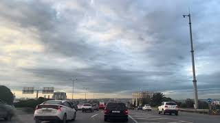 Daytime Rhythms Of Baku City Traffic And Tall Buildings