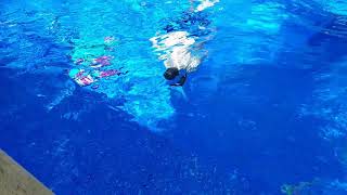 Kye jumping in pool