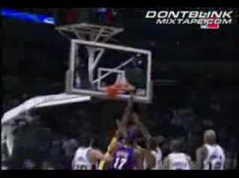 tim duncan shoes 2011. Kobe Bryant dunks on Tim