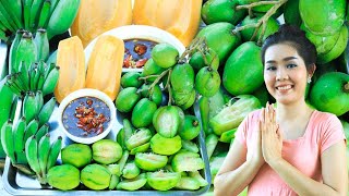 Young Charming Girl Eating Deliciously Young Banana, Papaya, June Plum With Mixed Salts Chili