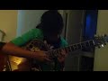 Elly playing guitar, well "Papa's guitar"