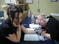 locust girl getting edward ka-spel's 'sing while you may' tattoo