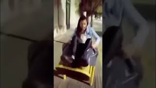 Girl Falls Of Trash Bin